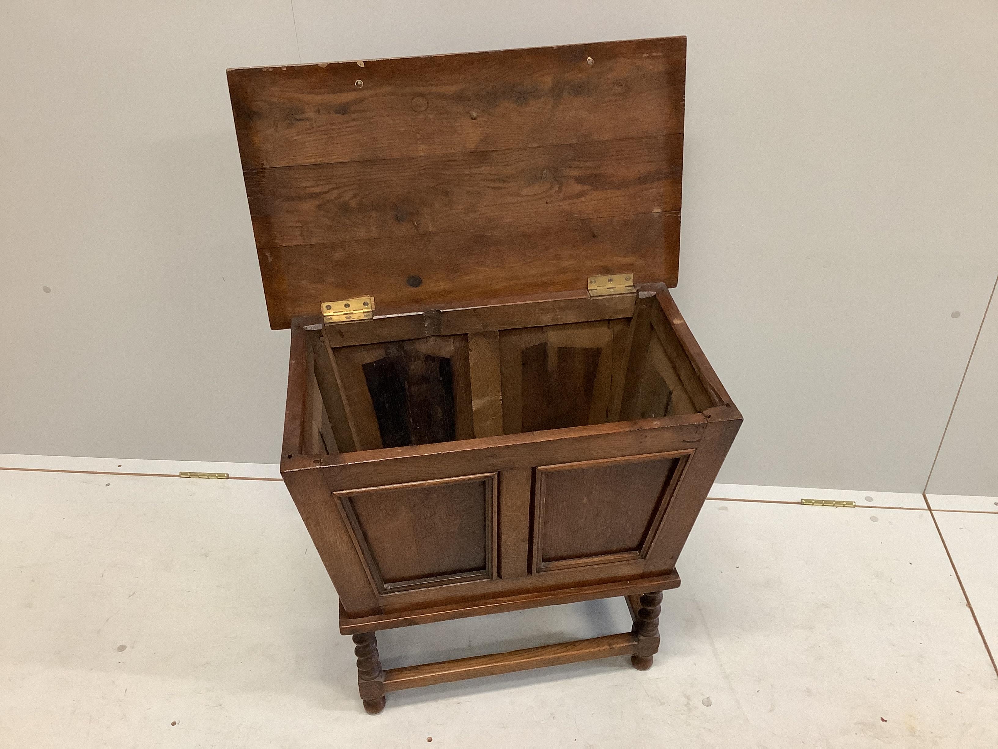 A 1920's oak cellarette, width 67cm, depth 39cm, height 64cm